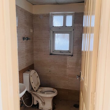 Bathroom in 3 BHK Apartment at Corona Optus, Basai Enclave 2 – for Rent