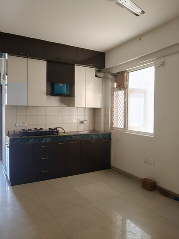 Kitchen in 2 BHK Apartment at ROF Aalayas, Sector 102 – for Rent