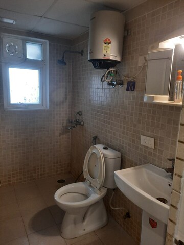 Bathroom in 4 BHK Apartment at Aditya Urban Casa, Sector 78 – for Rent