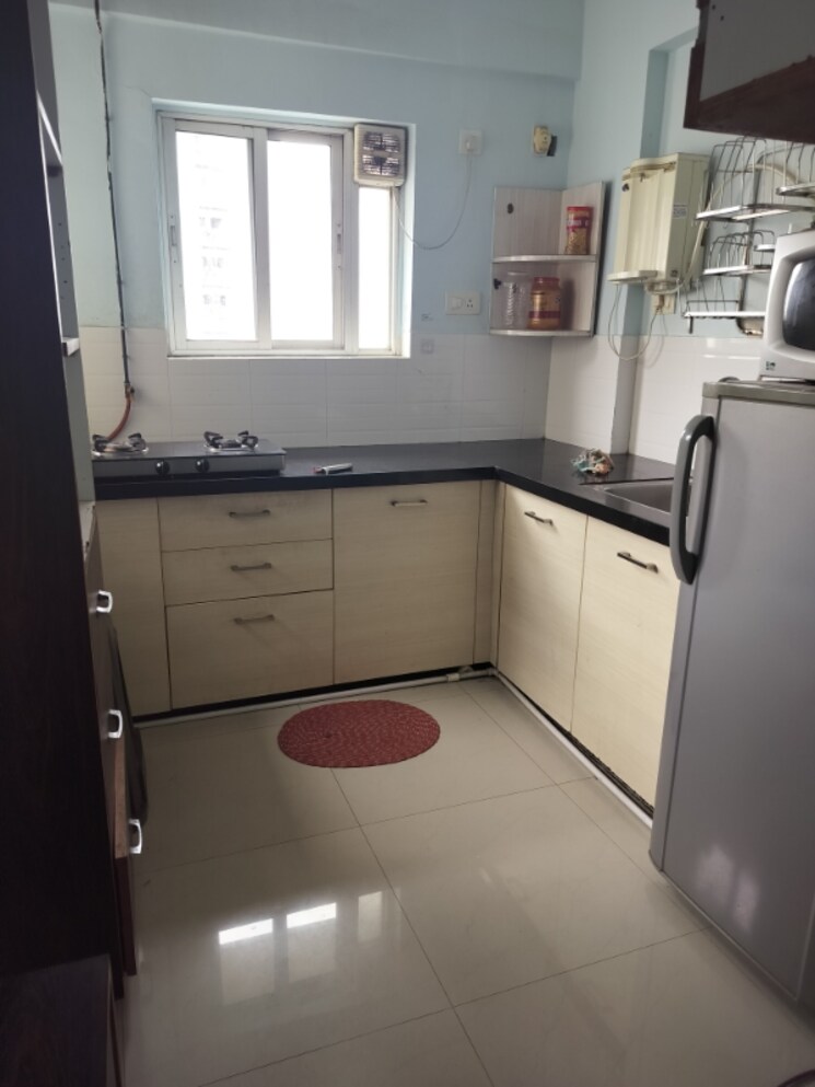 Kitchen, amanora-desire-tower 1 Bedroom 560 Sq.Ft. Apartment In Magarpatta Road Pune 8810927