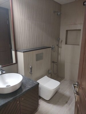 Bathroom in 4 BHK Apartment at Eros Edenwood Towers, Lakkarpur – for Sale