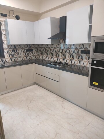 Kitchen in 4 BHK Apartment at Eros Edenwood Towers, Lakkarpur – for Sale