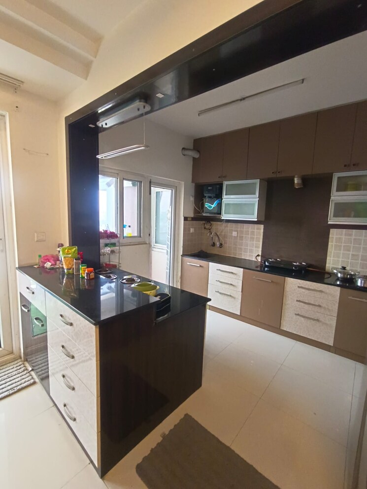 Kitchen, uber-verdant 3 Bedroom 1596 Sq.Ft. Apartment In Sarjapur Road Bangalore 8810901