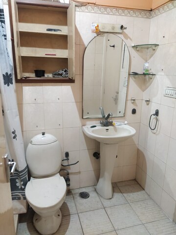 Bathroom in 4 BHK Apartment at Eros Garden Villas, Charmwood Village – for Sale