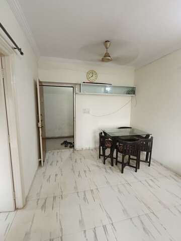 Master Bedroom in 2 BHK Apartment at Royal Palms Garden View, Goregaon East – for Rent