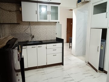 Kitchen in 2 BHK Apartment at Royal Palms Garden View, Goregaon East – for Rent