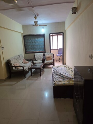 Living Room in 2 BHK Apartment at Margadarshan CHS, Andheri East – for Rent