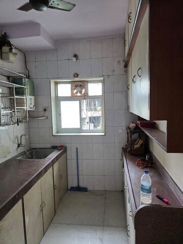 Kitchen in 2 BHK Apartment at Margadarshan CHS, Andheri East – for Rent