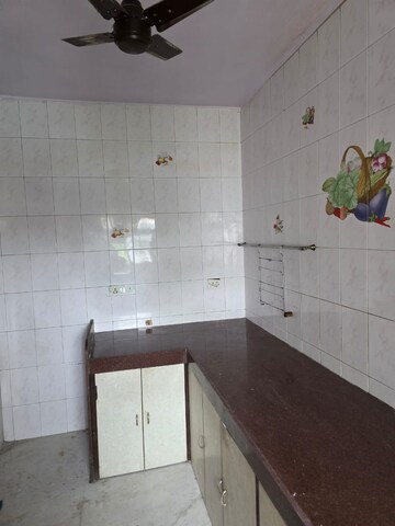 Kitchen in 2 BHK Apartment at Margadarshan CHS, Andheri East – for Rent
