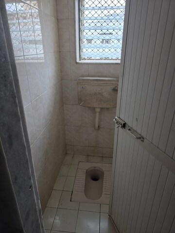 Bathroom in 2 BHK Apartment at Margadarshan CHS, Andheri East – for Rent