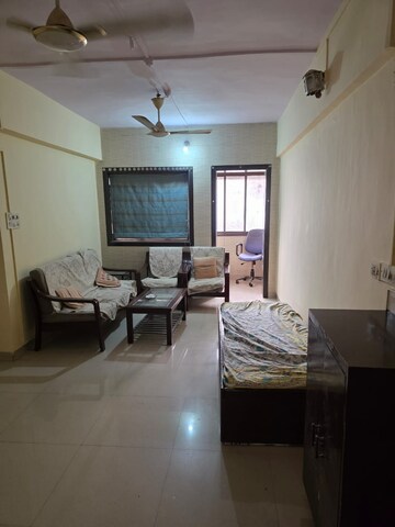 Living Room in 2 BHK Apartment at Margadarshan CHS, Andheri East – for Rent