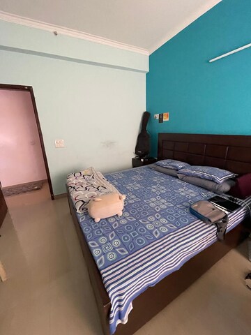 Bedroom in 3.5 BHK Apartment at Paramount Floraville, Sector 137 – for Rent