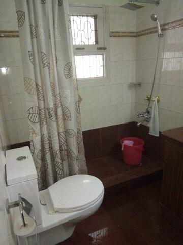 Bathroom in 4 BHK Builder Floor at New Friends Colony – for Rent