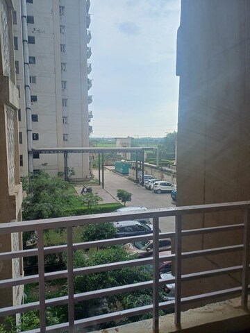 Balcony in 2 BHK Apartment at Urbtech Xaviers, Sector 168 – for Rent