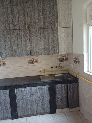 Kitchen in 2 BHK Apartment at Urbtech Xaviers, Sector 168 – for Rent