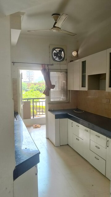 Kitchen in 3 BHK Apartment at Ramprastha Awho, Sector 95 – for Rent