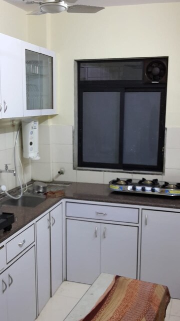 Kitchen in 1 BHK Apartment at Royal Palms, Goregaon East – for Rent
