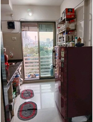 Kitchen in 1 BHK Apartment at RDC Woods Teakwoods, Ghodbunder Road – for Sale