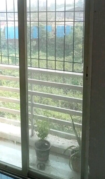 Balcony in 1 BHK Apartment at RDC Woods Teakwoods, Ghodbunder Road – for Sale