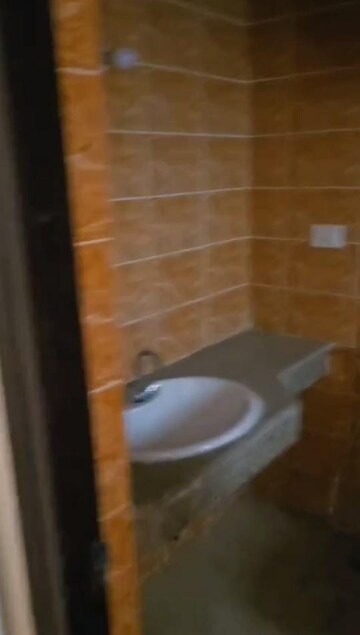 Bathroom in 2 BHK Apartment at Logix Blossom Greens, Sector 143 – for Rent
