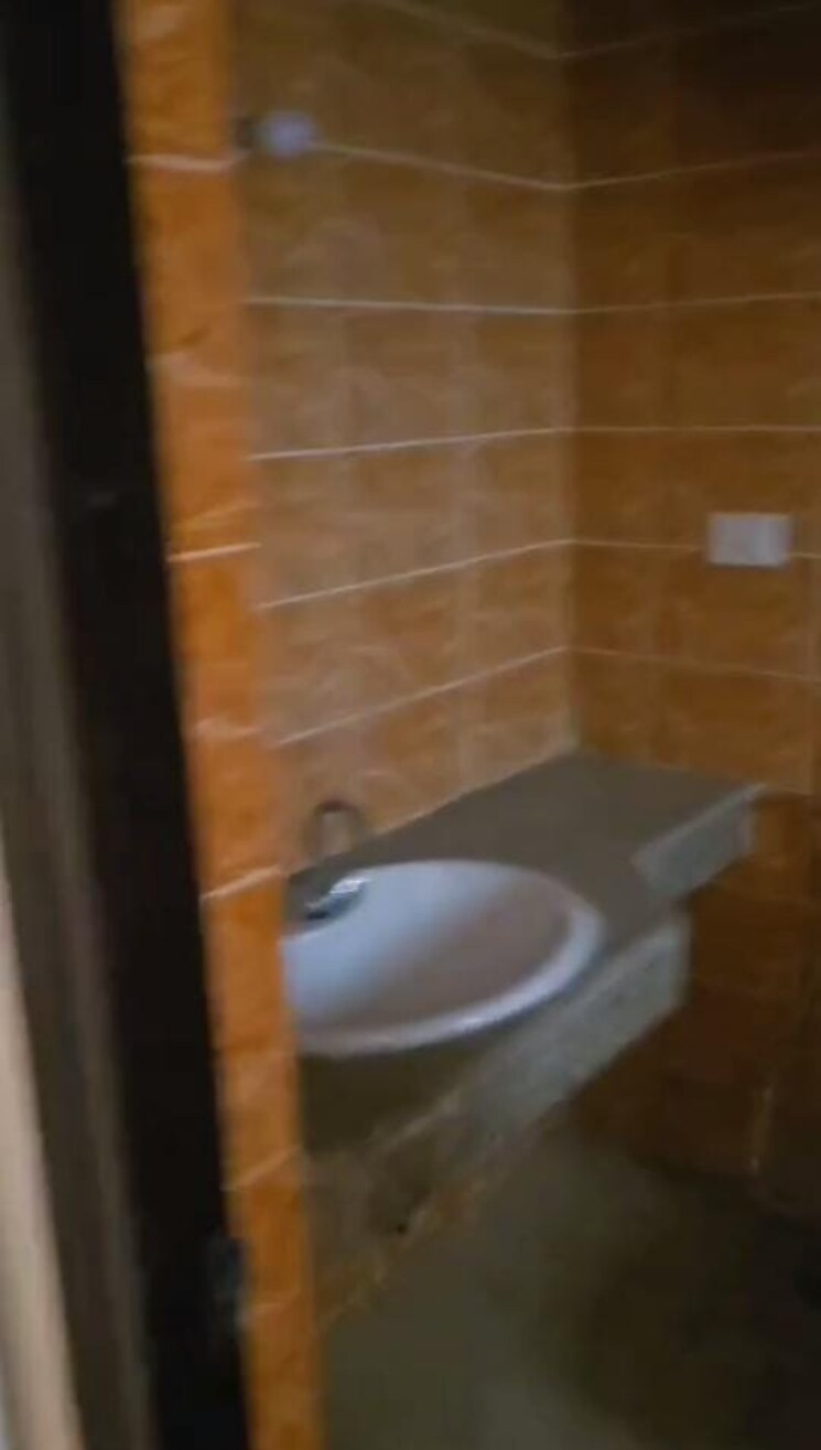 Bathroom, logix-blossom-greens 2 Bedroom 799 Sq.Ft. Apartment In Sector 143 Noida 8811275