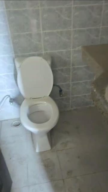 Bathroom in 2 BHK Apartment at Logix Blossom Greens, Sector 143 – for Rent
