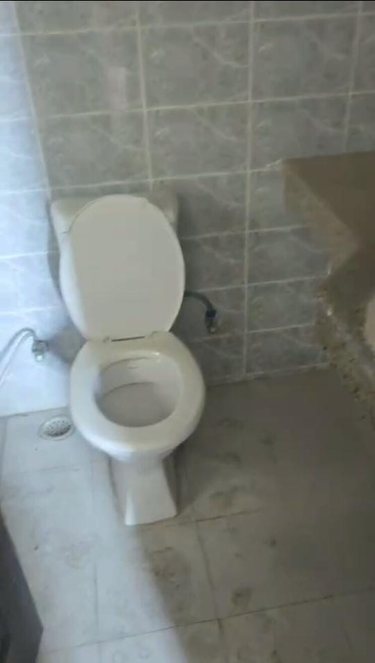 Bathroom, logix-blossom-greens 2 Bedroom 799 Sq.Ft. Apartment In Sector 143 Noida 8811275