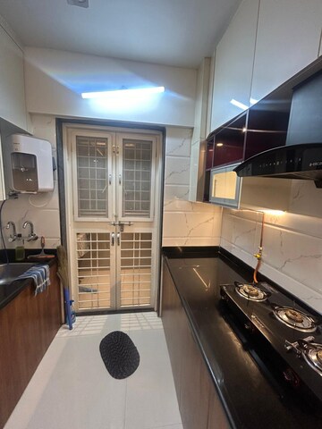Kitchen in 2 BHK Apartment at Prasun Sarvam, Kharadi – for Rent