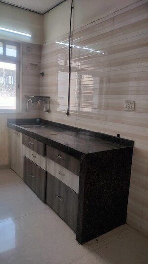 Kitchen in 3 BHK Apartment at Jawahar Nagar CHS Goregaon, Goregaon West – for Sale