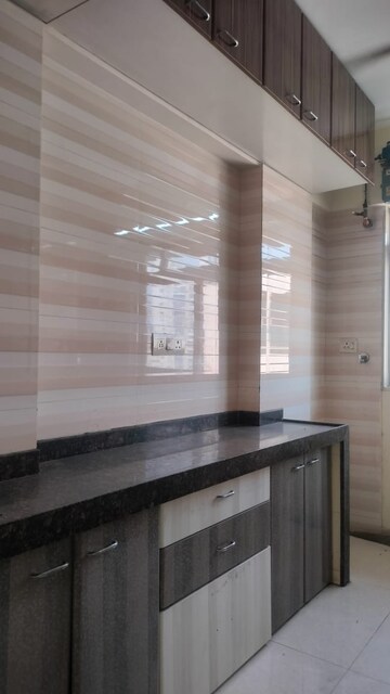 Kitchen in 3 BHK Apartment at Jawahar Nagar CHS Goregaon, Goregaon West – for Sale