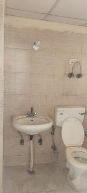 Bathroom in 2 BHK Apartment at Jaipuria Apartment, Dundahera – for Sale