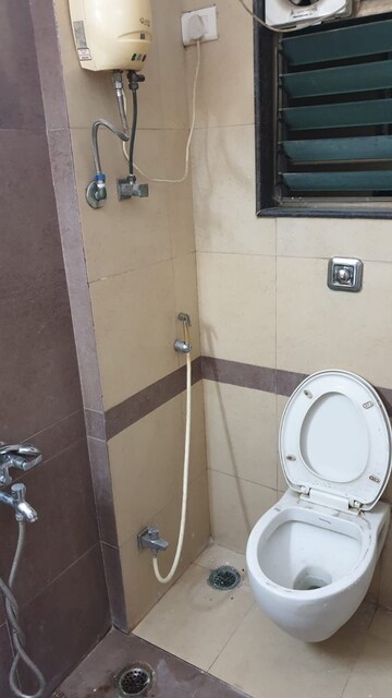 Bathroom in 2 BHK Apartment at Sai Simran Tower, Chembur – for Rent