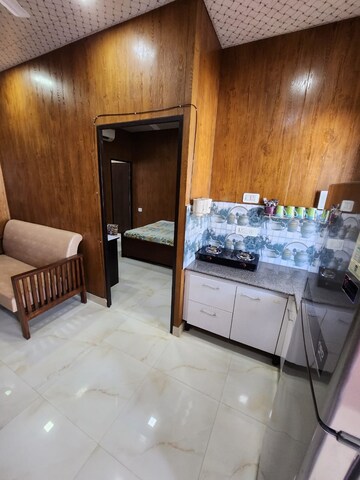 Kitchen in 2 BHK Builder Floor at Sarvodaya Enclave – for Rent
