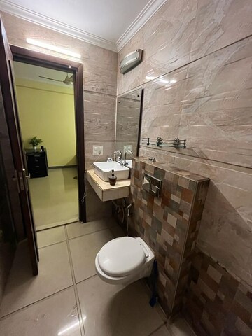 Bathroom in 4 BHK Builder Floor at Paryavaran Complex – for Rent