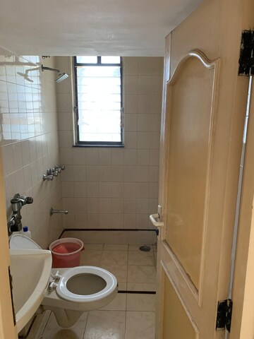 Bathroom in 2 BHK Apartment at Goregaon West View CHS, Goregaon West – for Rent