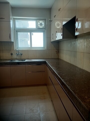 Kitchen in 4 BHK Apartment at 3C Lotus Panache, Sector 110 – for Rent