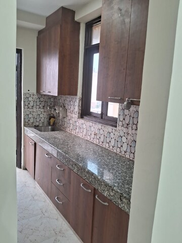 Kitchen in 2 BHK Apartment at Signature The Millennia 2, Sector 37d – for Rent