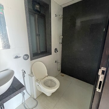 Bathroom in 1 BHK Apartment at Lalani Grandeur, Riddhi Gardens – for Rent