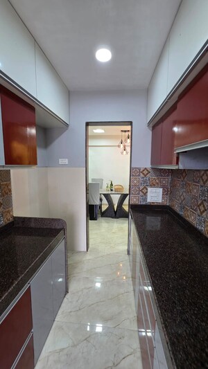 Kitchen in 3 BHK Apartment at Swapnalok Towers, Malad East – for Sale