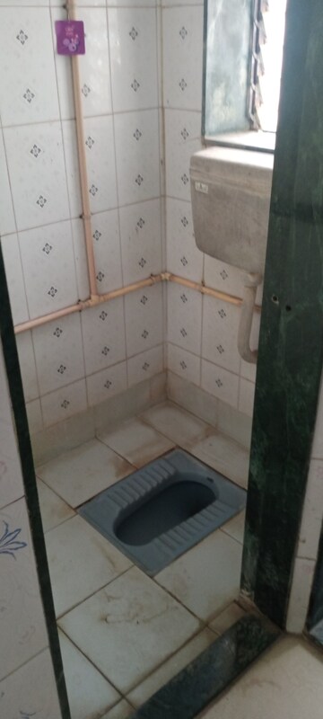 Bathroom in 1 BHK Apartment at Sai Anand CHS, Andheri East – for Rent