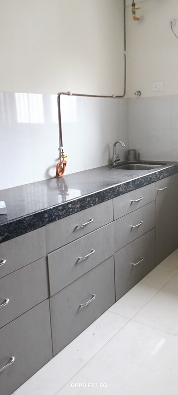 Kitchen in 2 BHK Apartment at Ashar Axis, Majiwada – for Rent