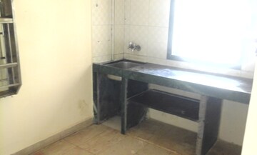 Kitchen in 1 BHK Apartment at Rebelo CHS, Andheri East – for Sale