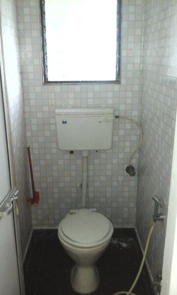 Bathroom in 1 BHK Apartment at Rebelo CHS, Andheri East – for Sale