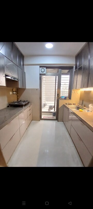 Kitchen in 2 BHK Apartment at T Bhimjyani Neelkanth Woods, Manpada – for Rent