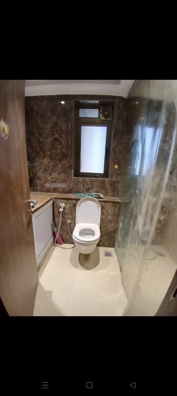 Bathroom in 2 BHK Apartment at T Bhimjyani Neelkanth Woods, Manpada – for Rent