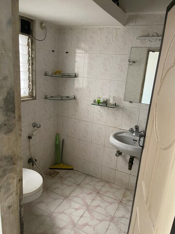 Bathroom in 3.5 BHK Apartment at Serenity Complex, Andheri West – for Rent