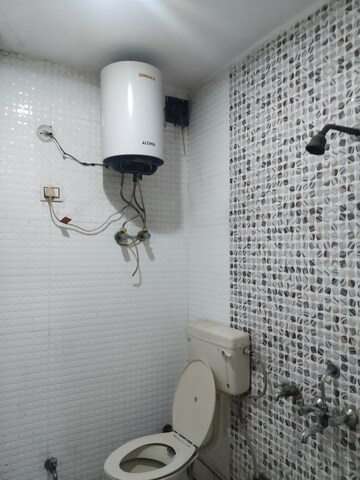 Bathroom in 1.5 BHK Apartment at Sarita Vihar – for Rent