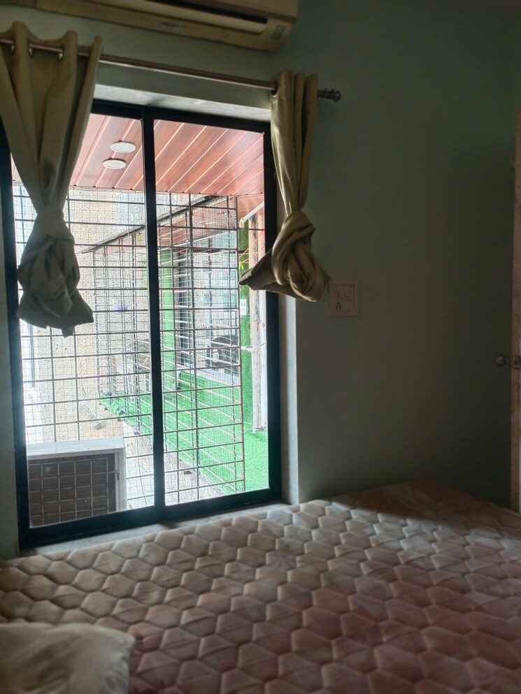 Bedroom, royal-palms-garden-view 2 Bedroom 780 Sq.Ft. Apartment In Goregaon East Mumbai 8813105