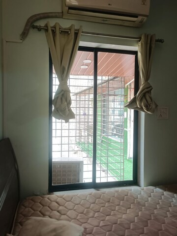 Bathroom in 2 BHK Apartment at Royal Palms Garden View, Goregaon East – for Rent