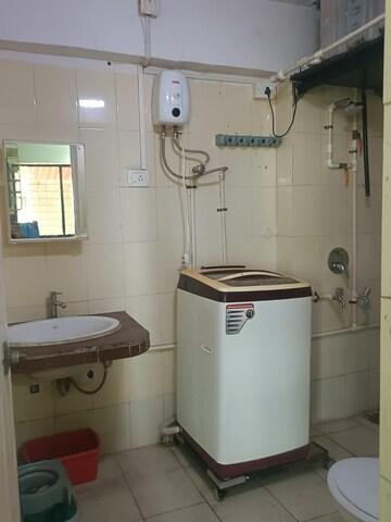 Kitchen in 2 BHK Apartment at Royal Palms Garden View, Goregaon East – for Rent